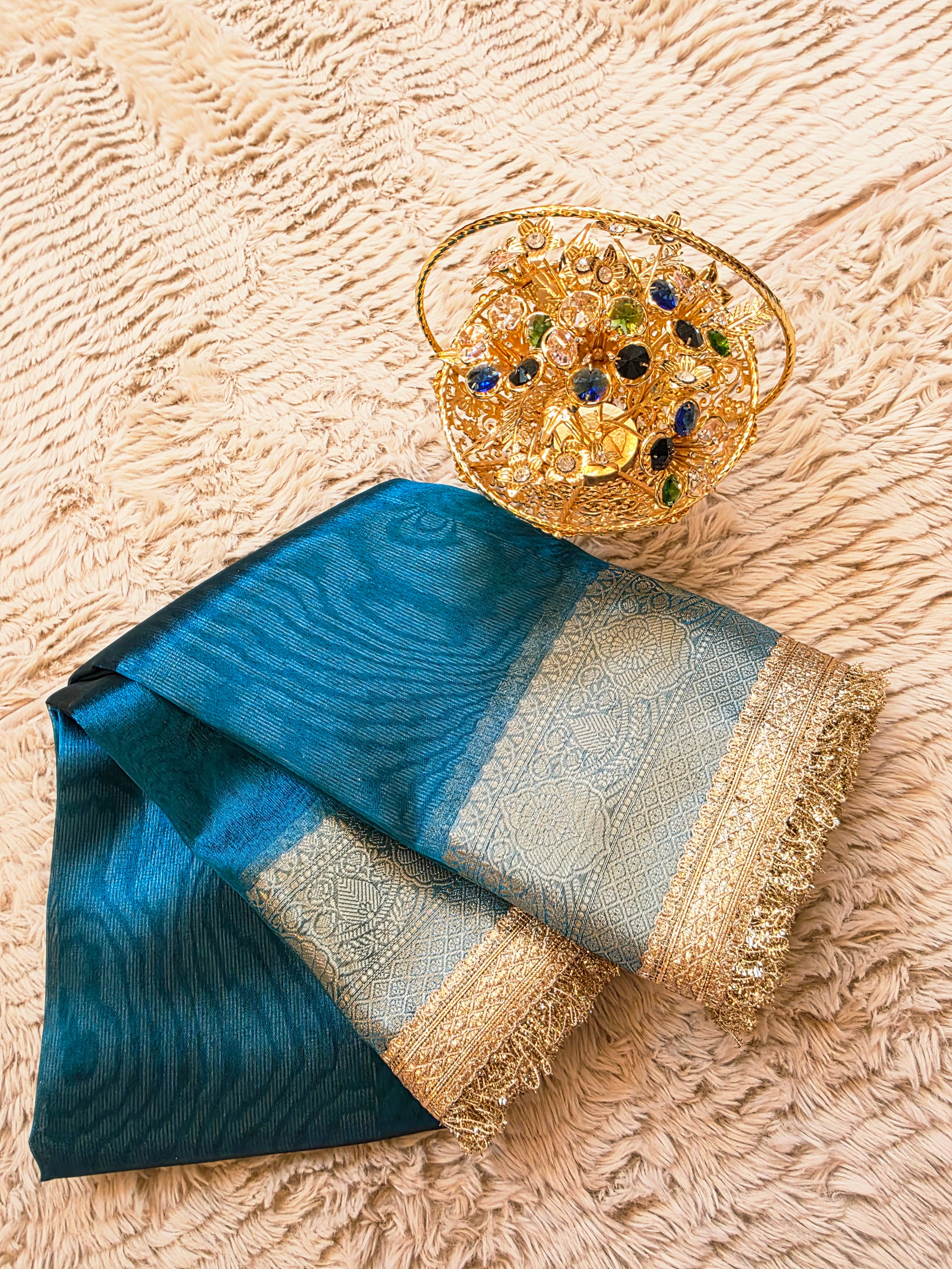 Royal Banarasi Tissue Saree having Plain Body & Lace Border